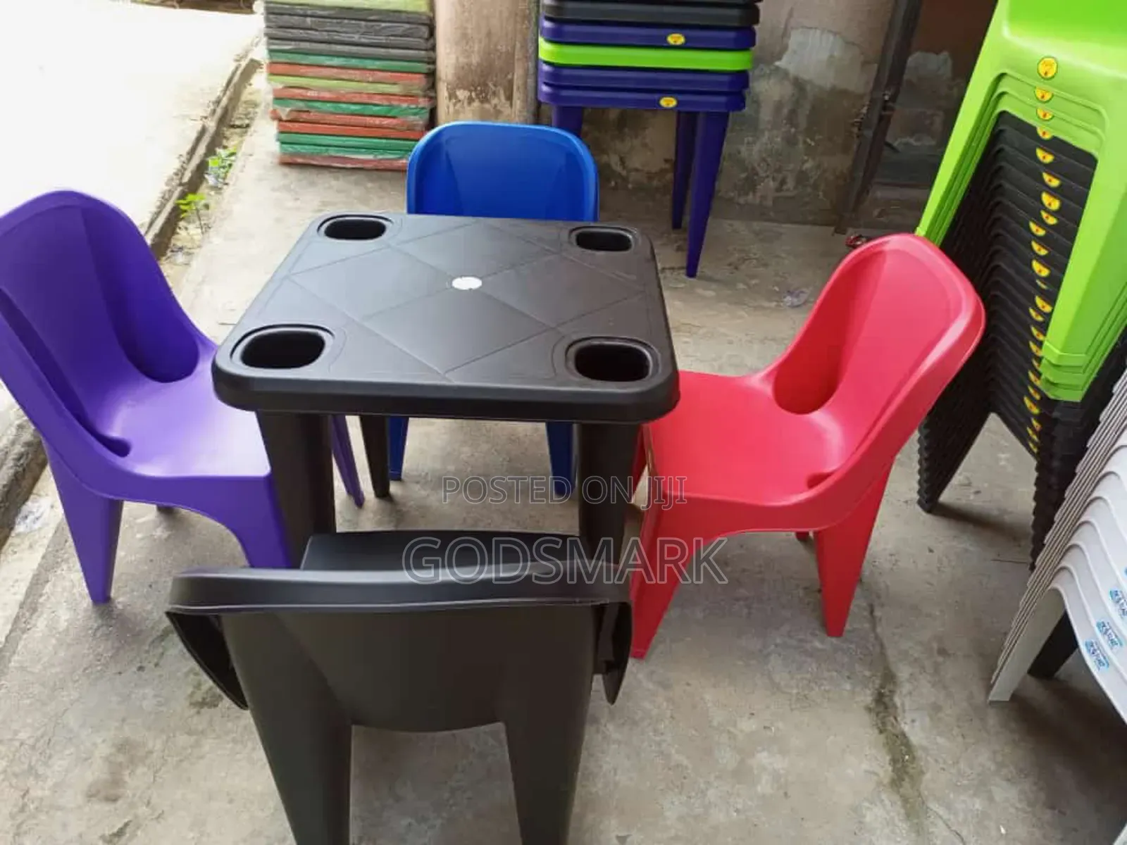 A Set of Elephant Legs Plastic Chair and Table.