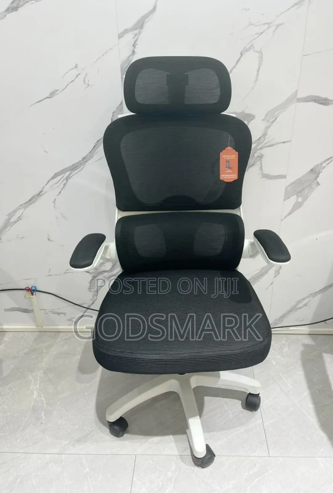 Unique Office Chair Swivel With White Back and Headrest.