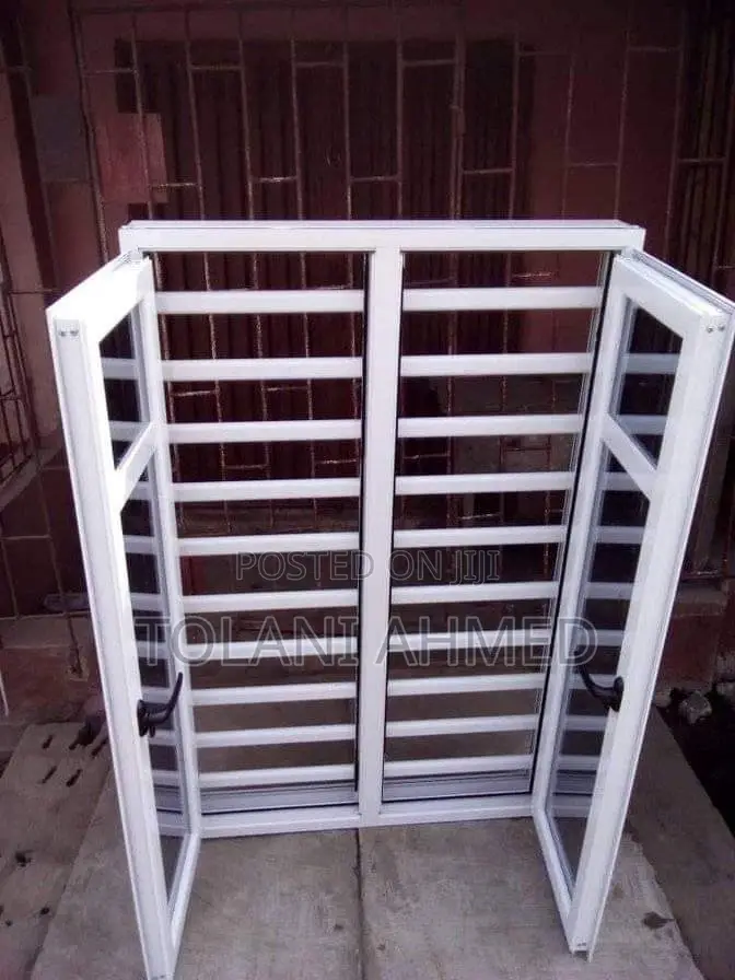 White Casement Window With Burglary and Net