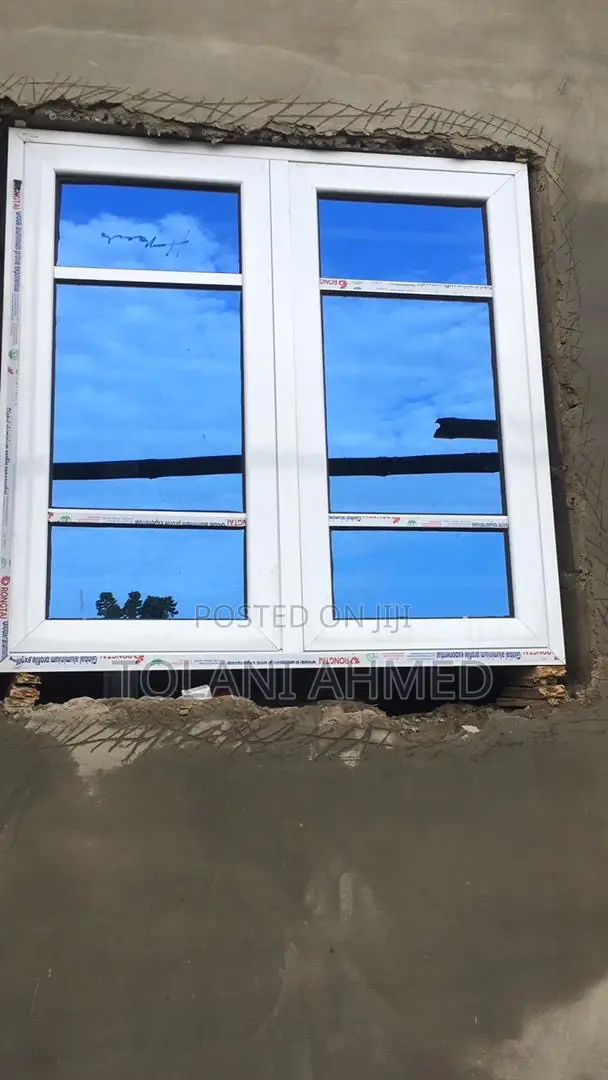 White Casement Window With Burglary and Net