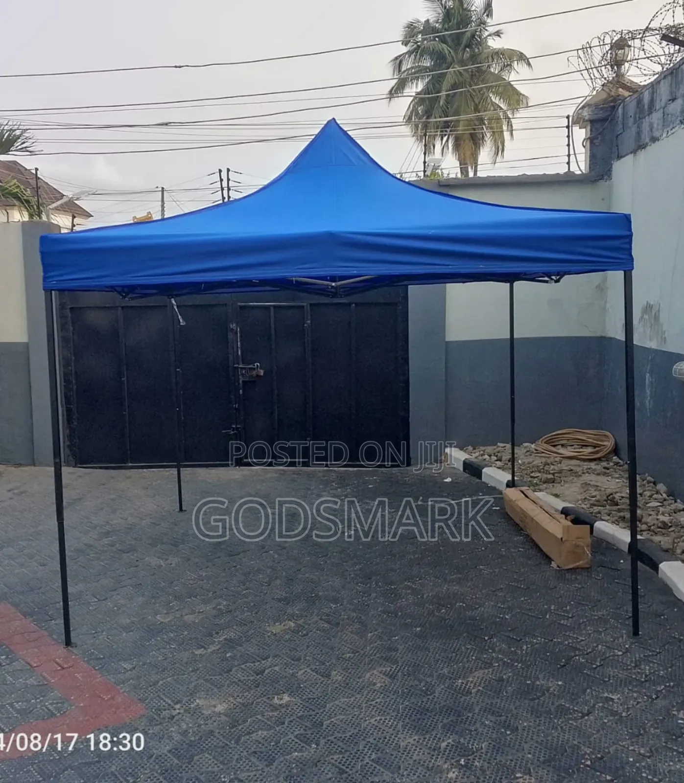 Imported Foldable Canopy 10 by 10 Feet in Black Metal.