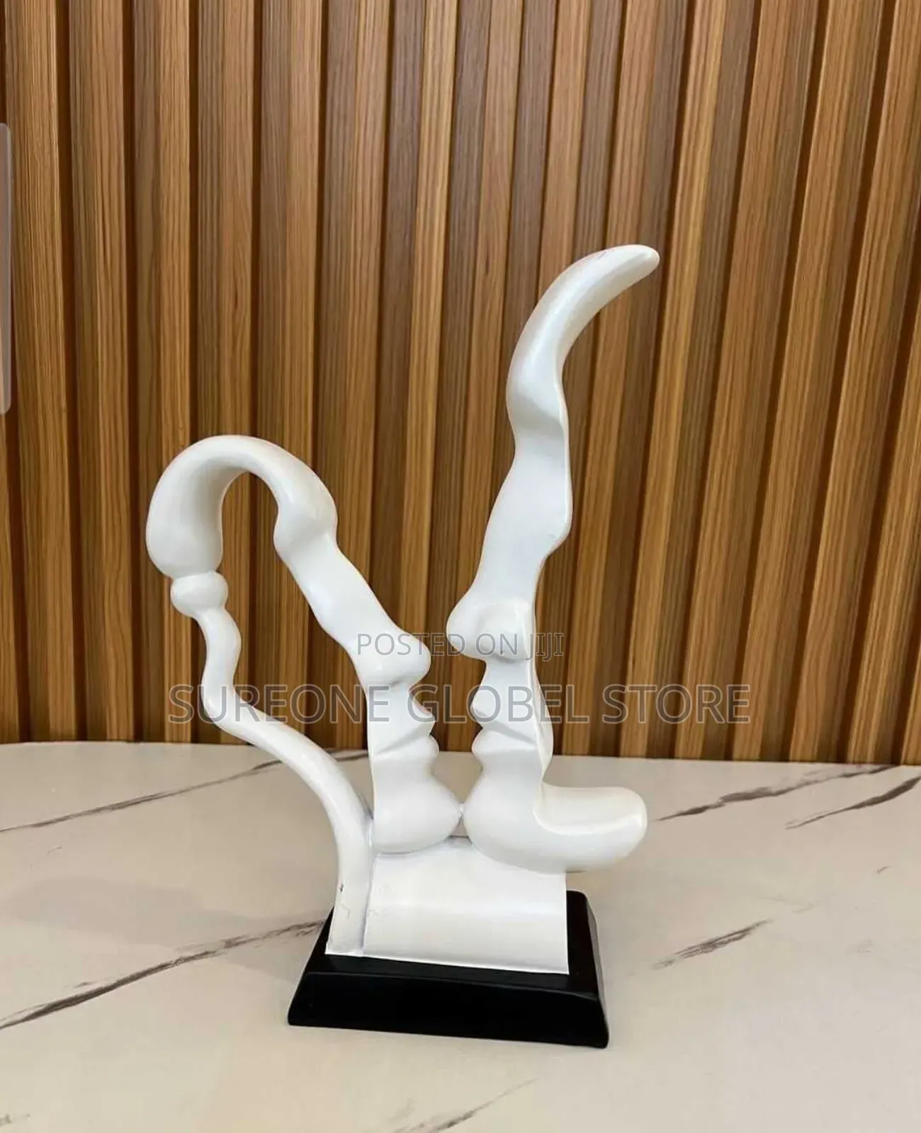 Couple Kissing Face Statue