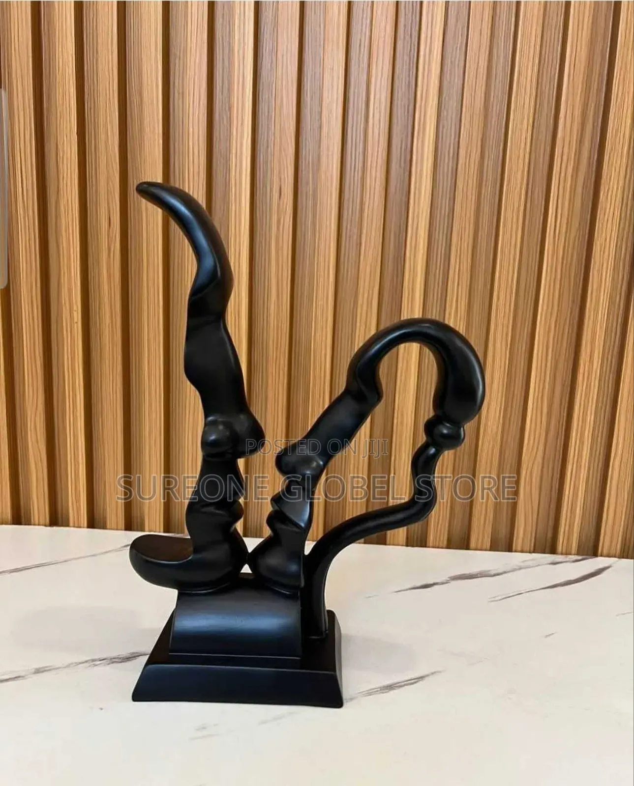 Couple Kissing Face Statue