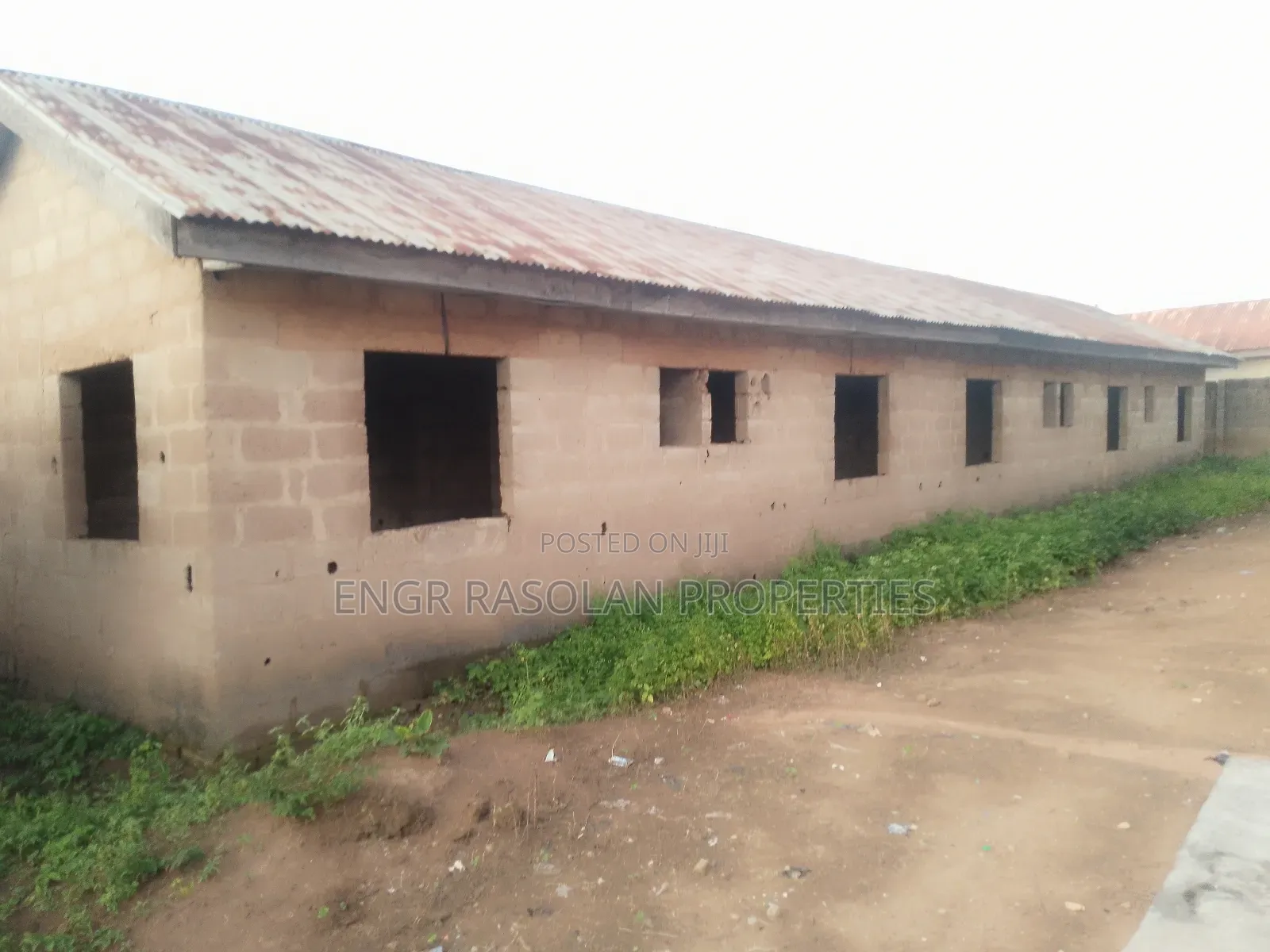 For Sale 2 Bedroom Apartment and 10 Room Uncompleted Hostel