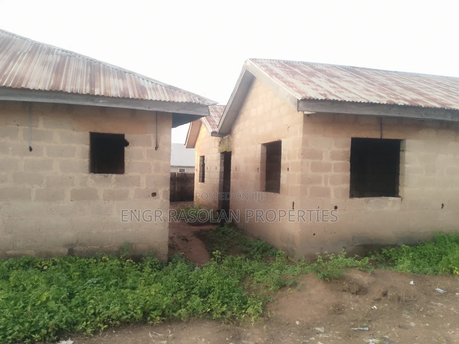 For Sale 2 Bedroom Apartment and 10 Room Uncompleted Hostel