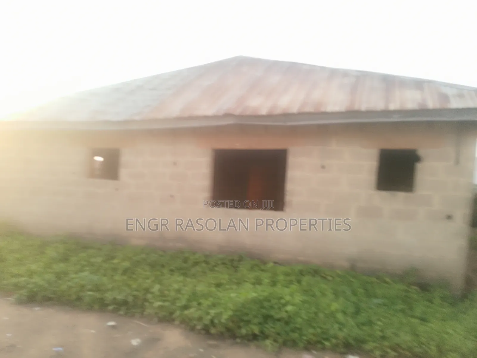 For Sale 2 Bedroom Apartment and 10 Room Uncompleted Hostel