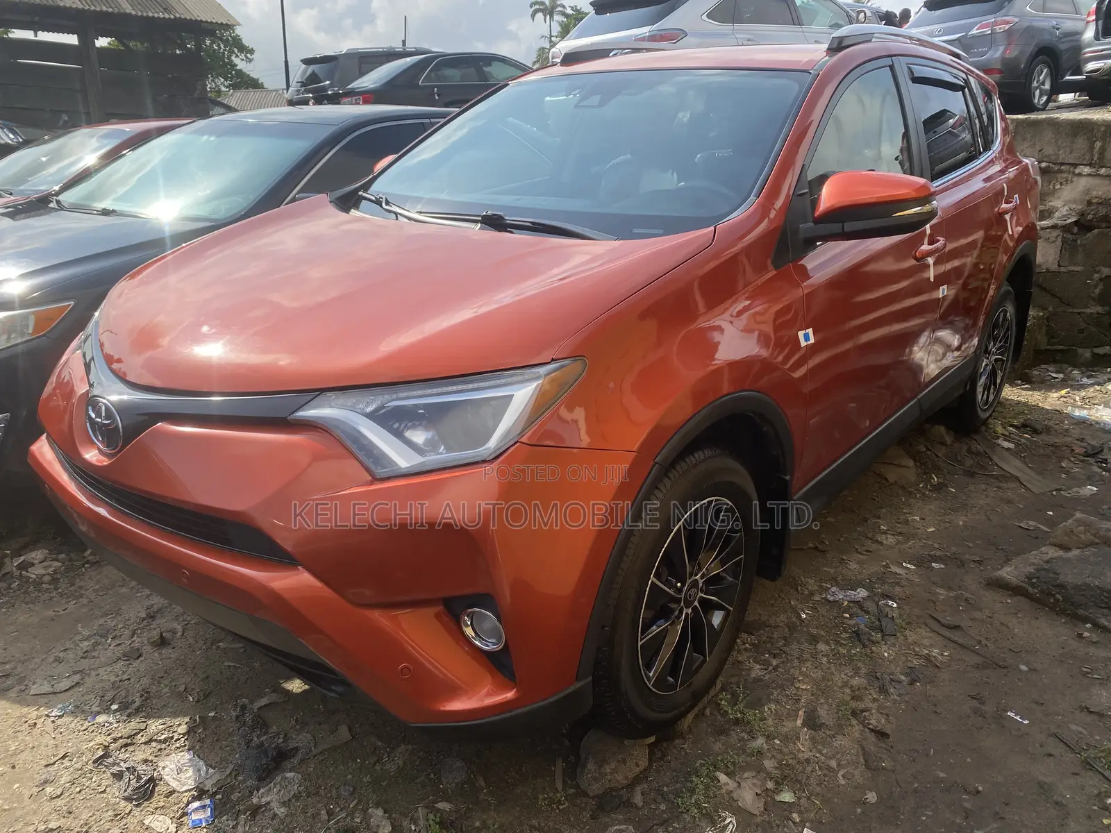 Toyota RAV4 LE AWD (2.5L 4cyl 6A) 2016 Orange
