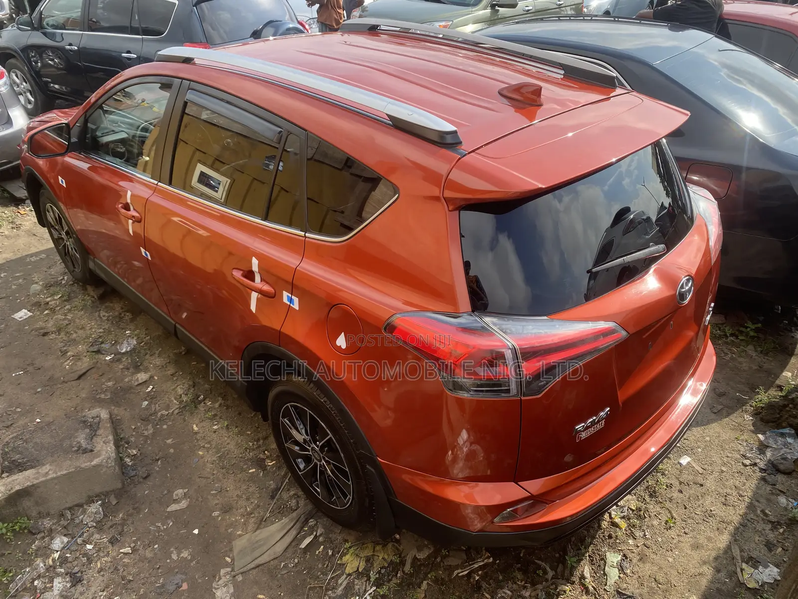 Toyota RAV4 LE AWD (2.5L 4cyl 6A) 2016 Orange