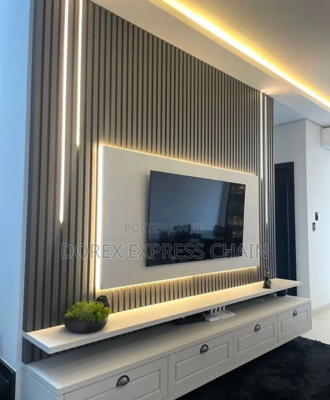 Space-Saving Wall-Mounted TV Stand With Down Shelves