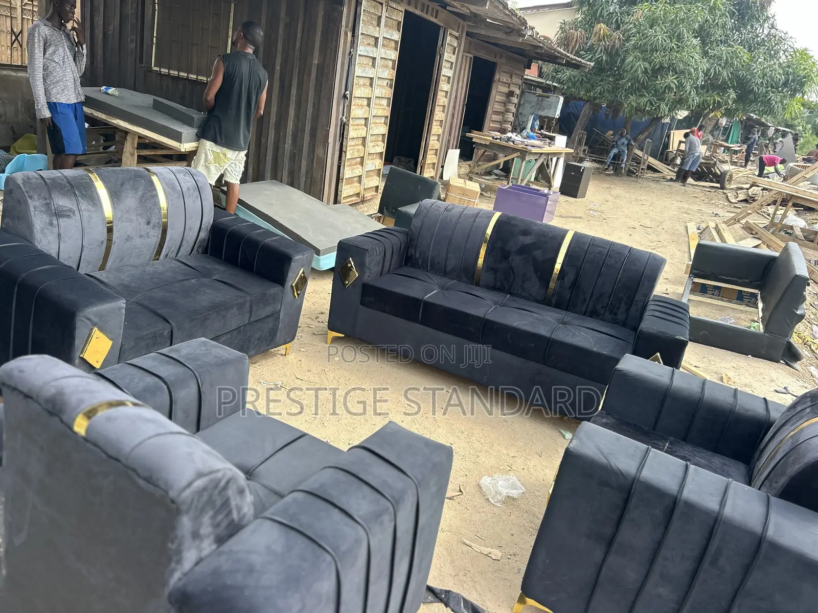 A Complete Black Set of Sofa