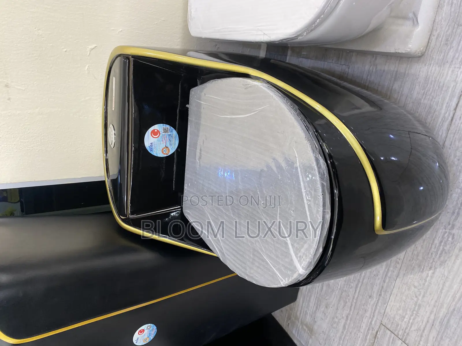 Glossy Black With Touch Of Gold Water Closets