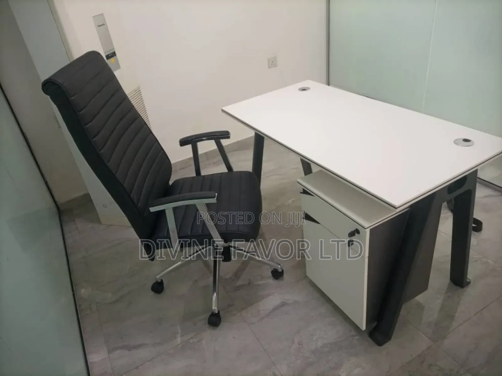 A Set of Office Desk and Chair With Movable Drawer.