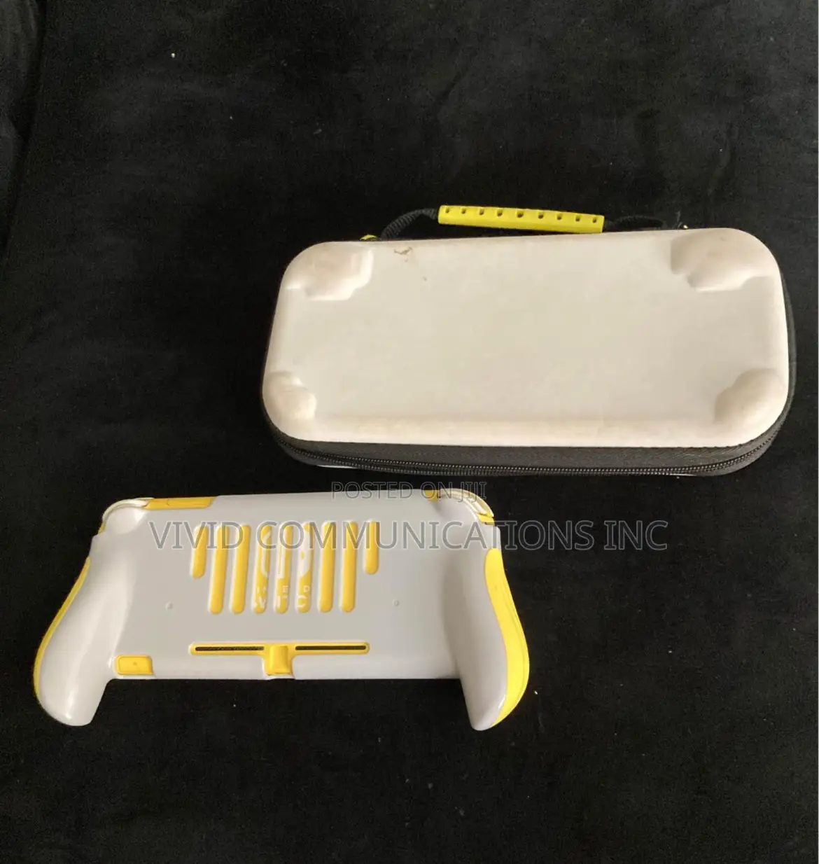 Yellow Nintendo Switch Lite - With Protective Case and Bag.