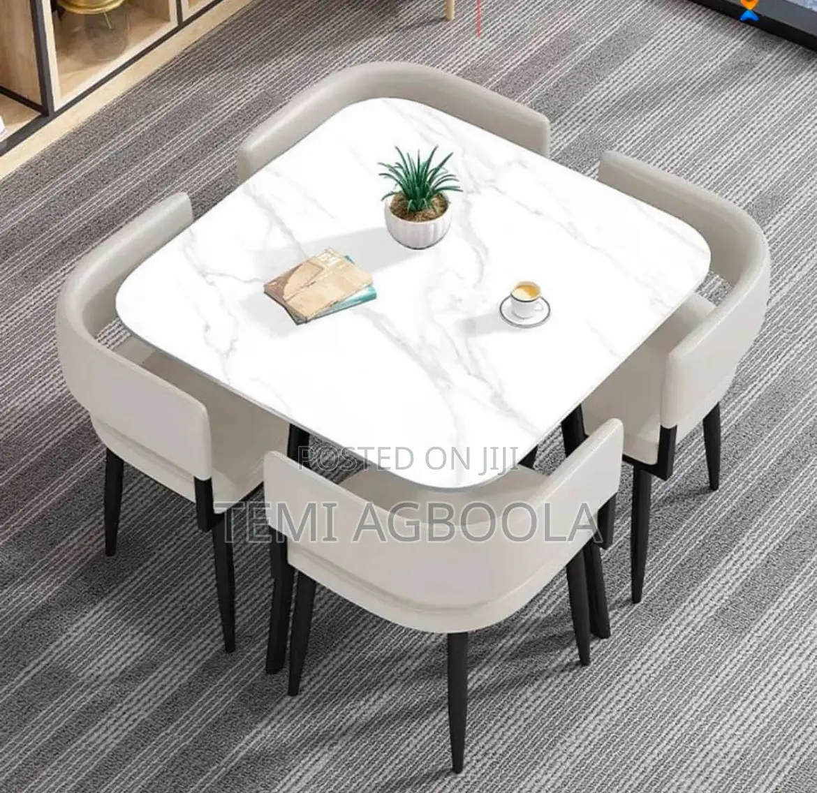 Four Seater Dinning Table With Marble Top