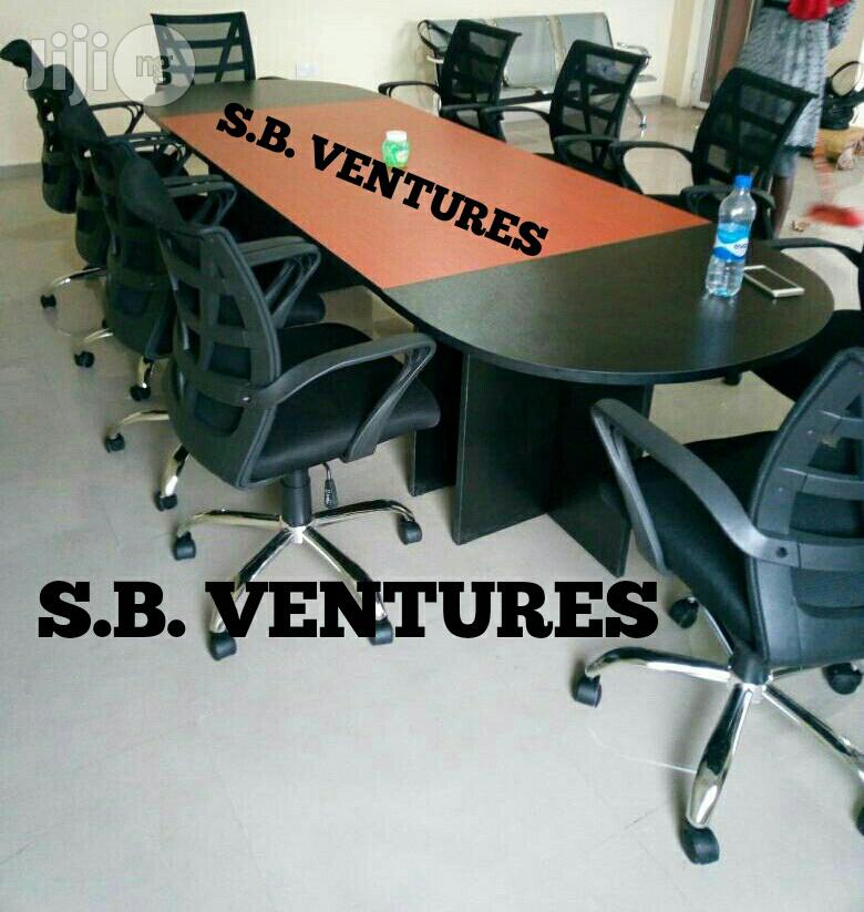 Conference Table Together With 10 Chairs