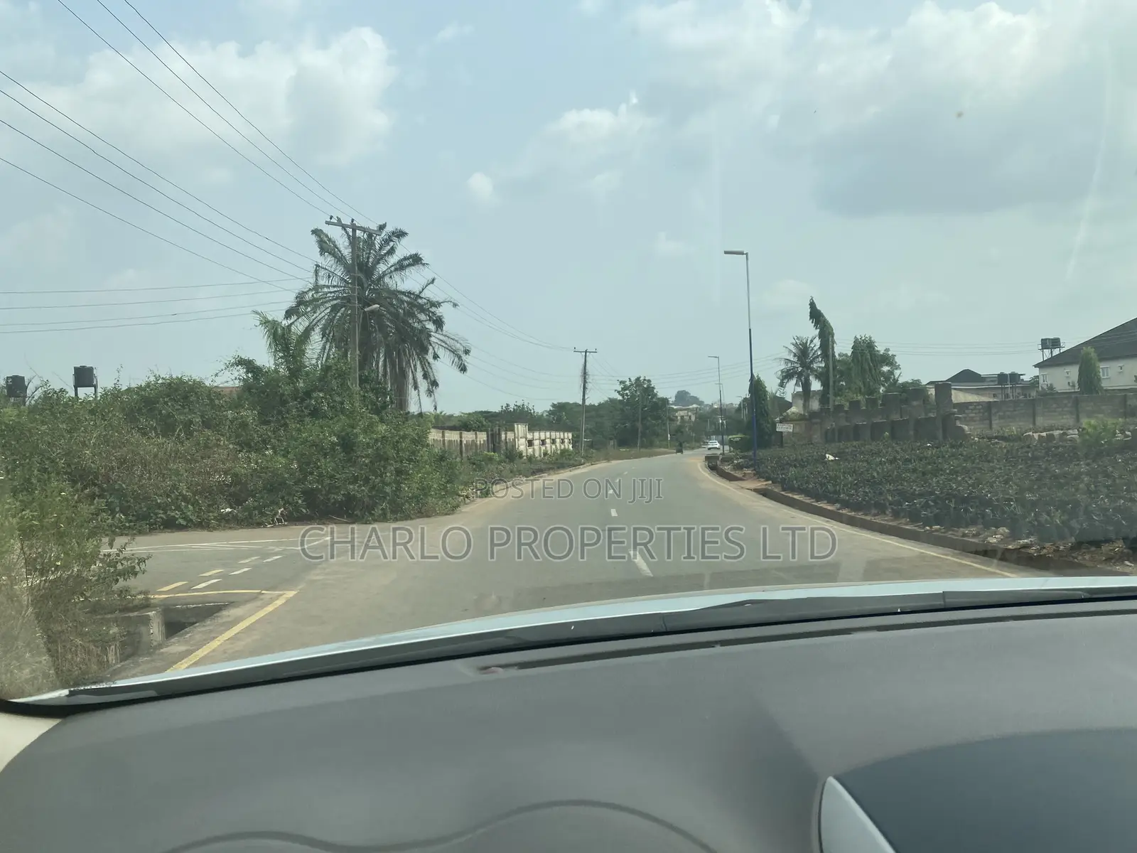 Genuine 100ft by 140ft on a Tarred Road at New Etete Layout