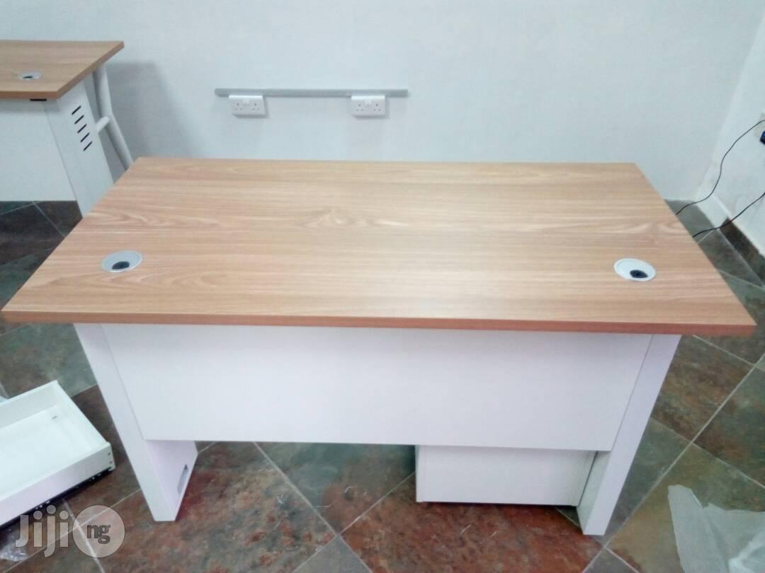 Light Brown And White Table With Mobile And Metal Legs