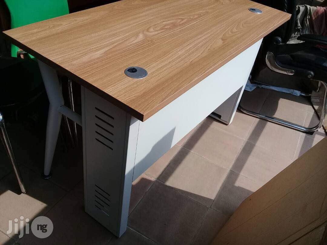 Light Brown And White Table With Mobile And Metal Legs