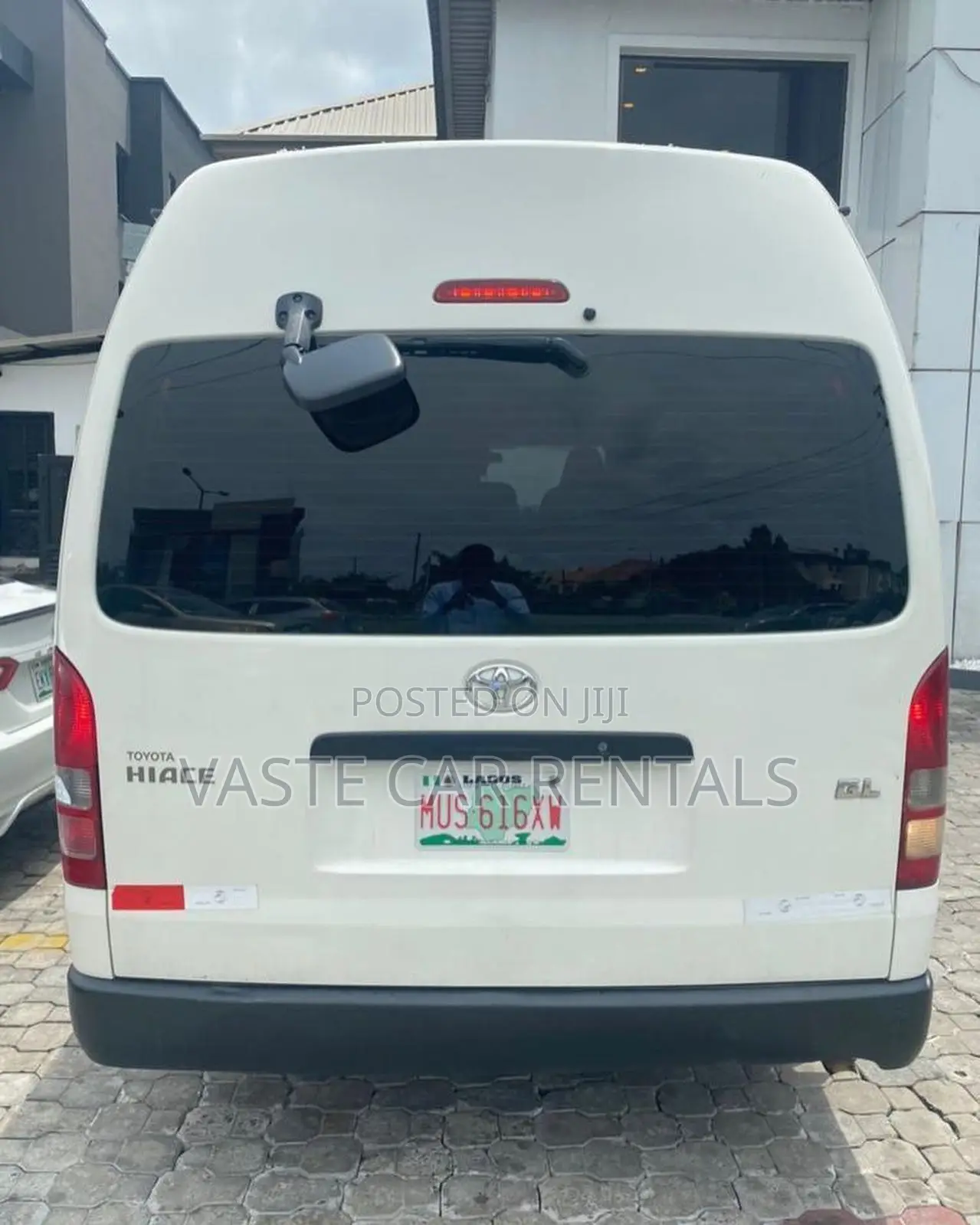 Air-Conditioned White Toyota Hiace for Rent.