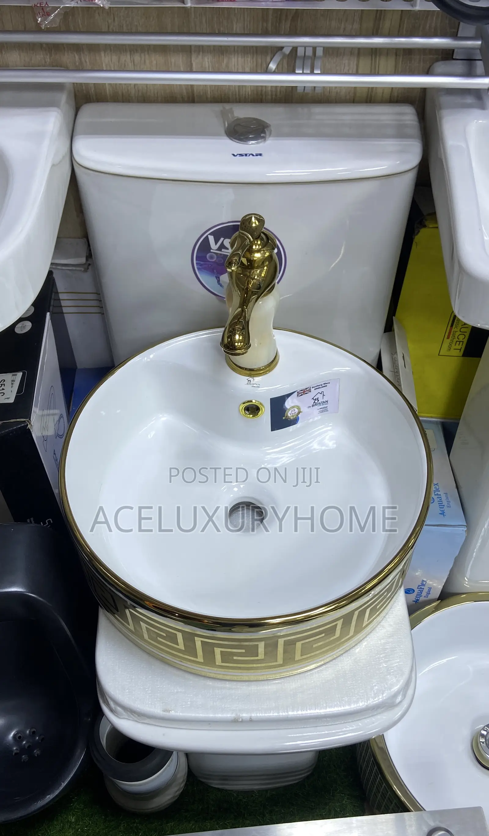 Gold and White Countertop Basin With Faucet