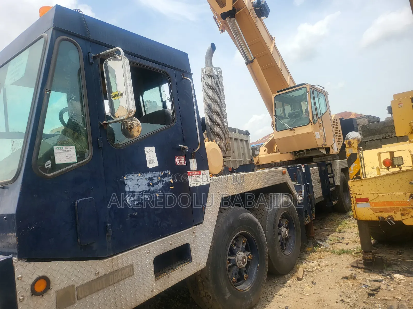 Tokunbo Moto Crane