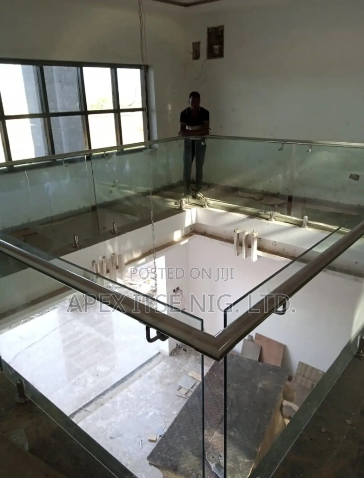 U-form Glass Balcony With Black Pipe