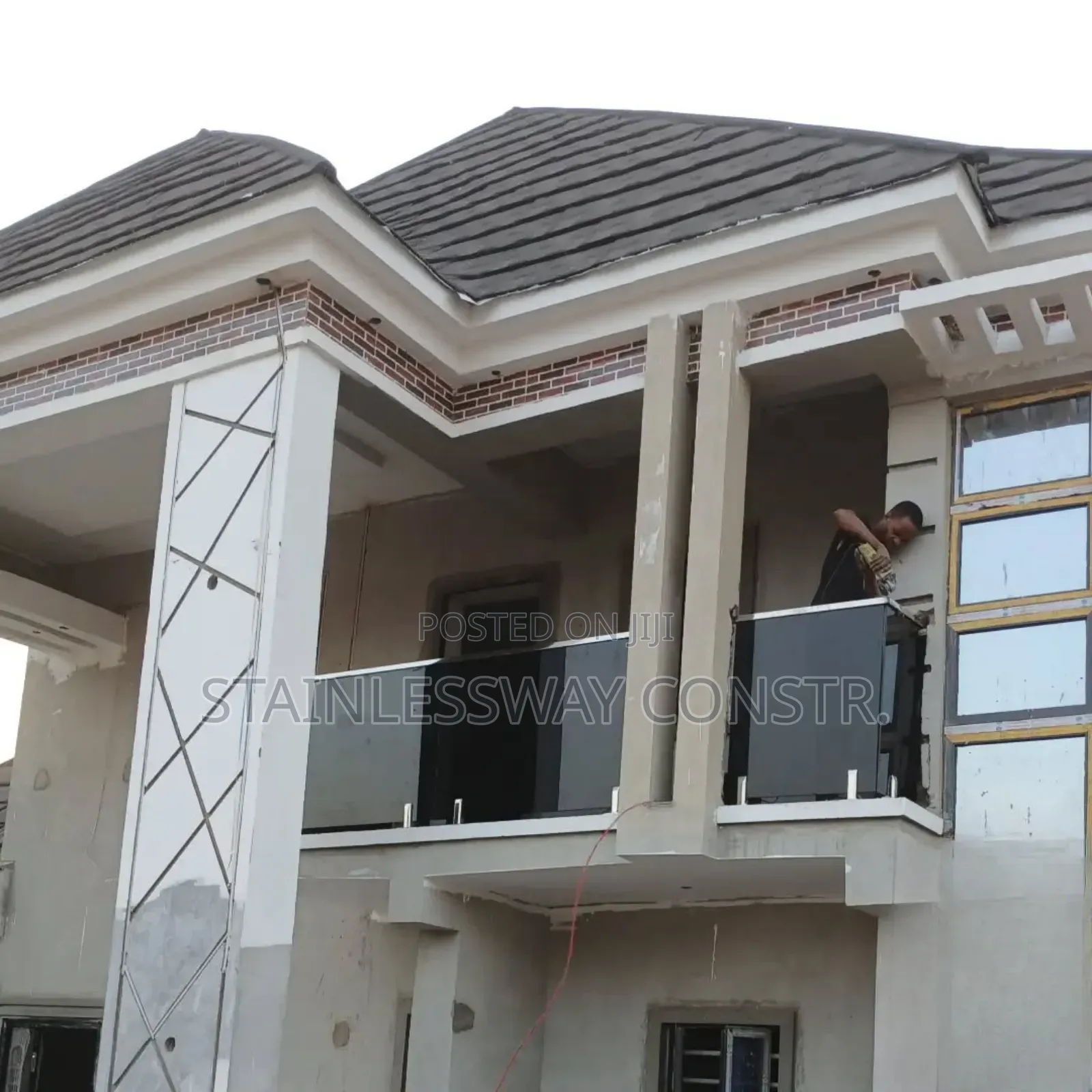 Dark Grey Balcony Glass Railing With Silver Spigot and Top