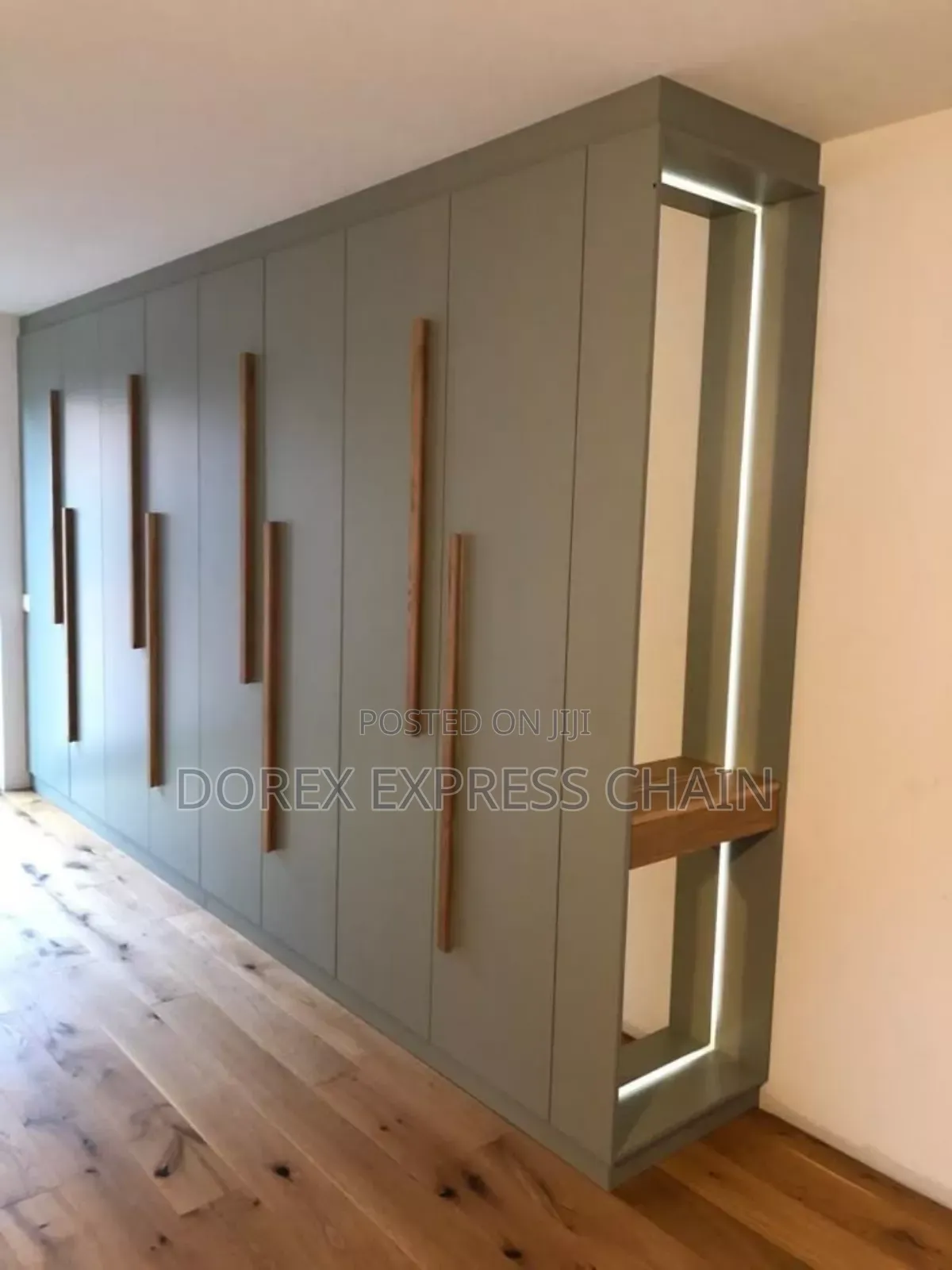 Custom Built-in Wardrobe With Integrated Display Niche.