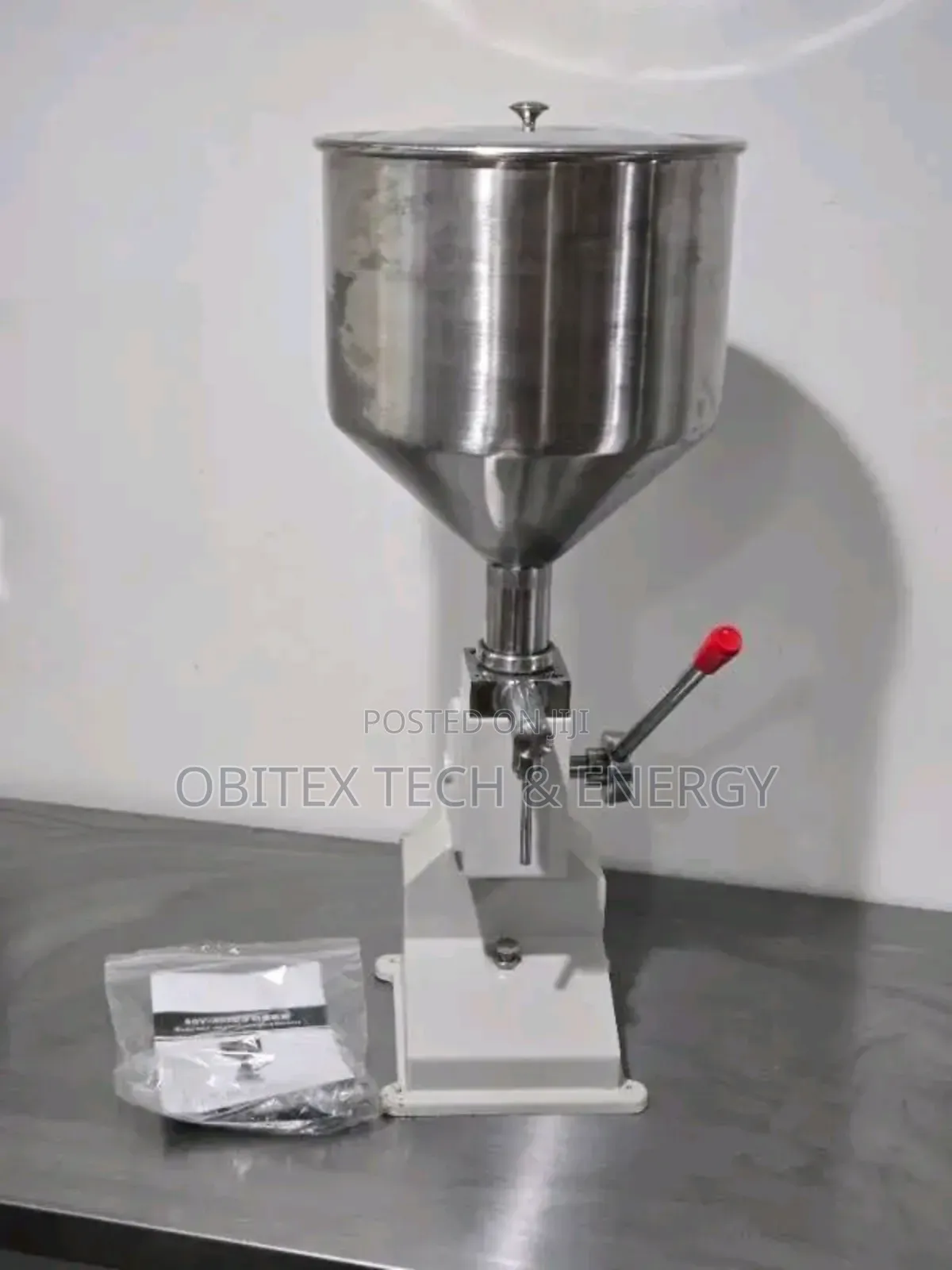Stainless Steel Manual Liquid Filling Machine (5–50 Ml)