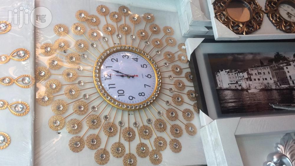 Golden Unique Wall Clock .