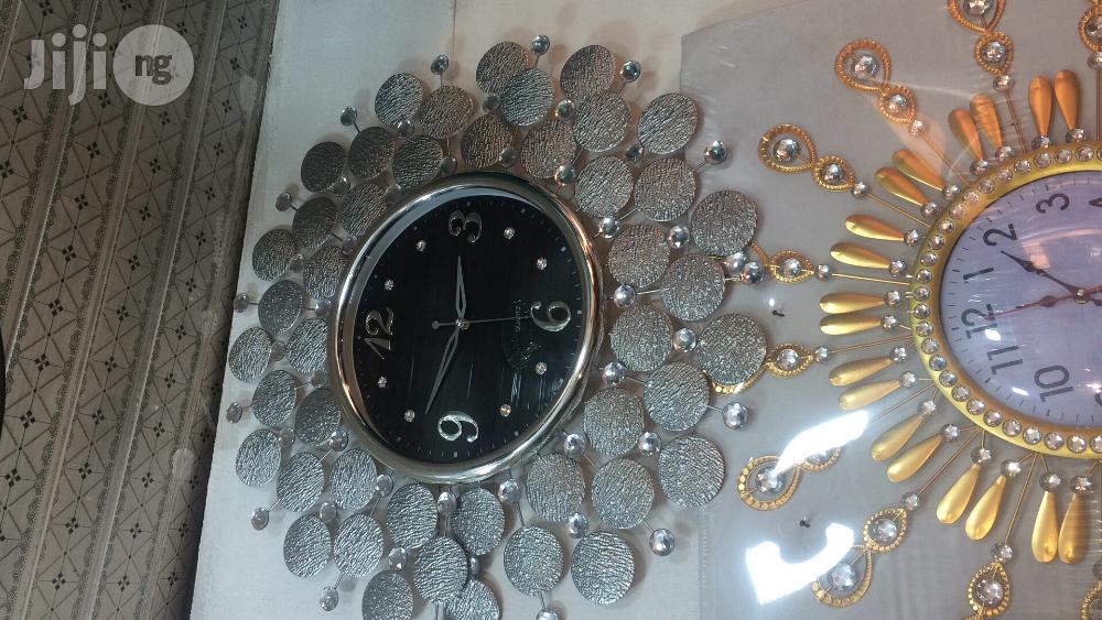 Unique Silver Wall Clock.