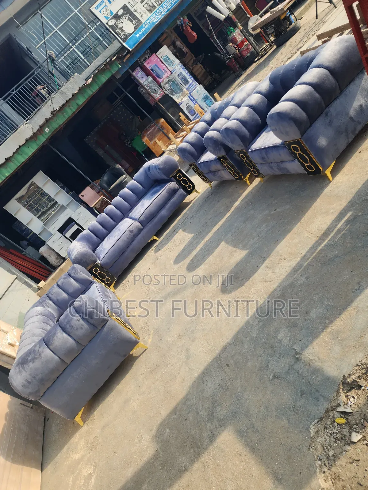 A Set of 7 Seaters Grey Padded Sofa.