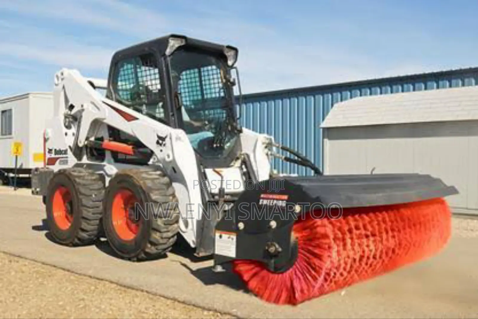 Bobcat With Broom