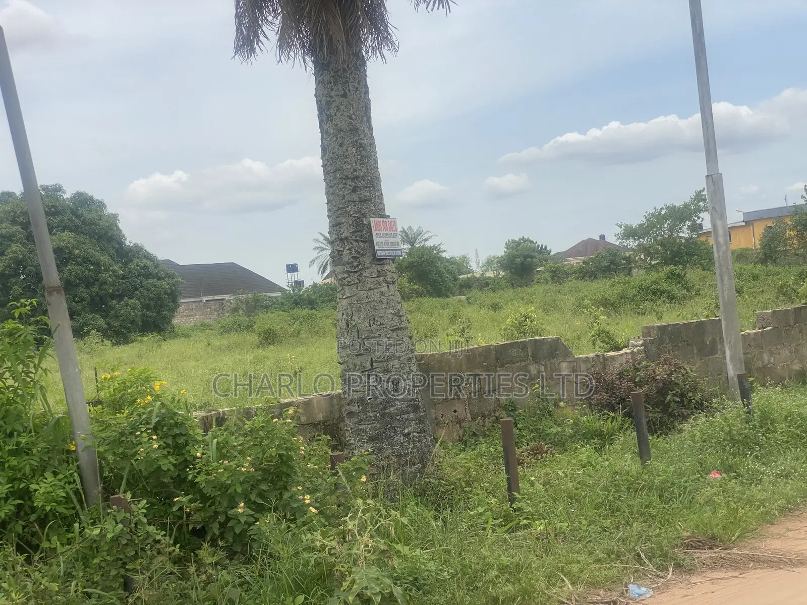 400ft by 400ft(16plots) on a Tarred Road at Ugbor, G.R.A.