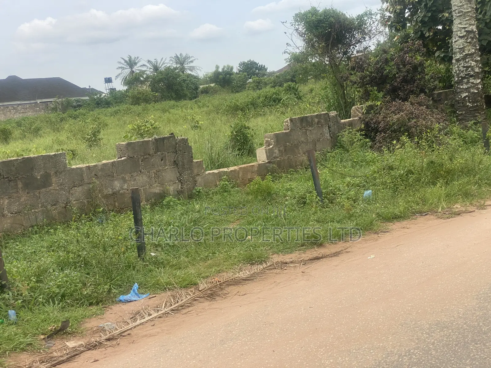400ft by 400ft(16plots) on a Tarred Road at Ugbor, G.R.A.