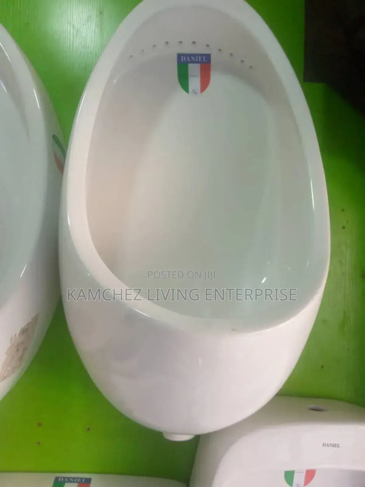 Wall-Mounted Ceramic Urinal With Concealed Drain