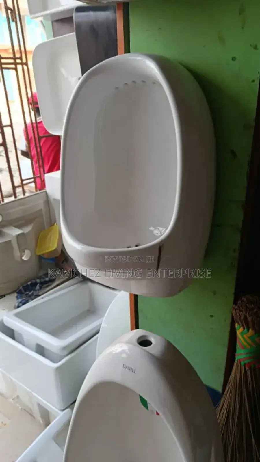 Oval Wall-Mounted Ceramic Urinal – White – 640x345x290mm