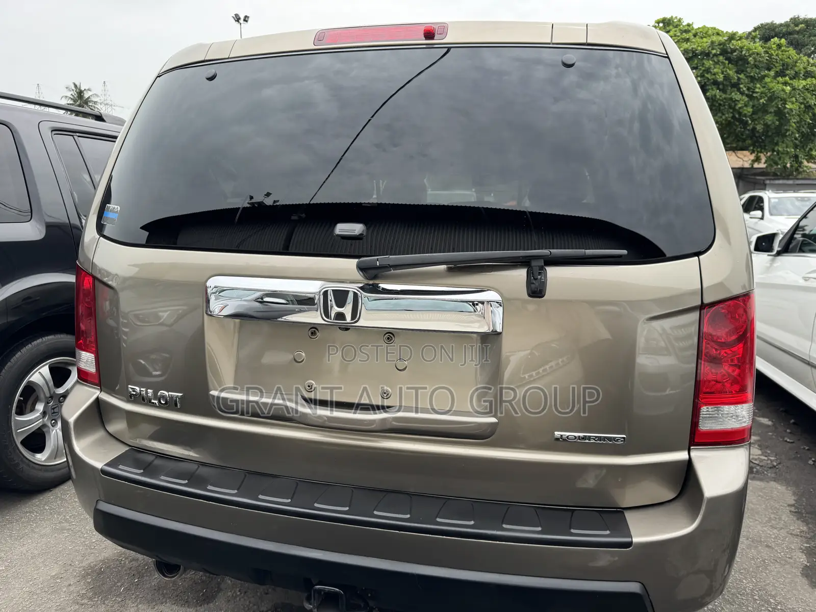 Honda Pilot Touring w/RES/Navi 4WD (3.5L 6cyl 5A) 2011 Gold