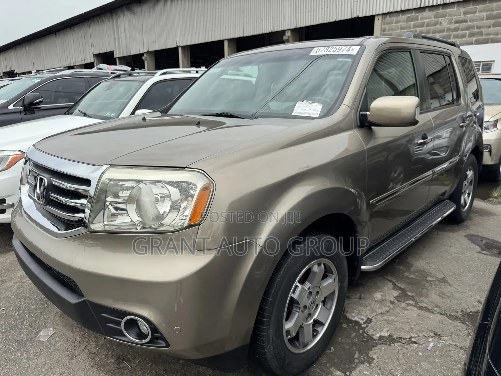 Honda Pilot Touring w/RES/Navi 4WD (3.5L 6cyl 5A) 2011 Gold