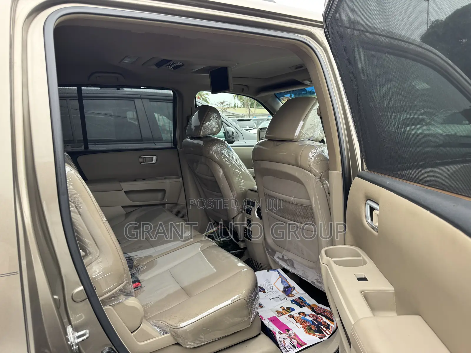 Honda Pilot Touring w/RES/Navi 4WD (3.5L 6cyl 5A) 2011 Gold