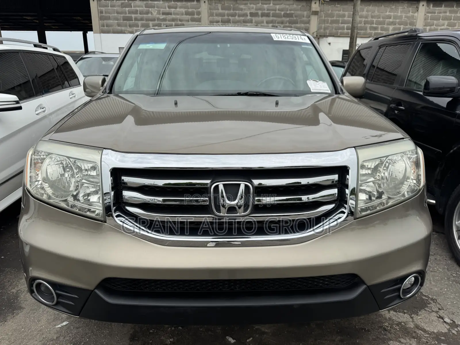 Honda Pilot Touring w/RES/Navi 4WD (3.5L 6cyl 5A) 2011 Gold