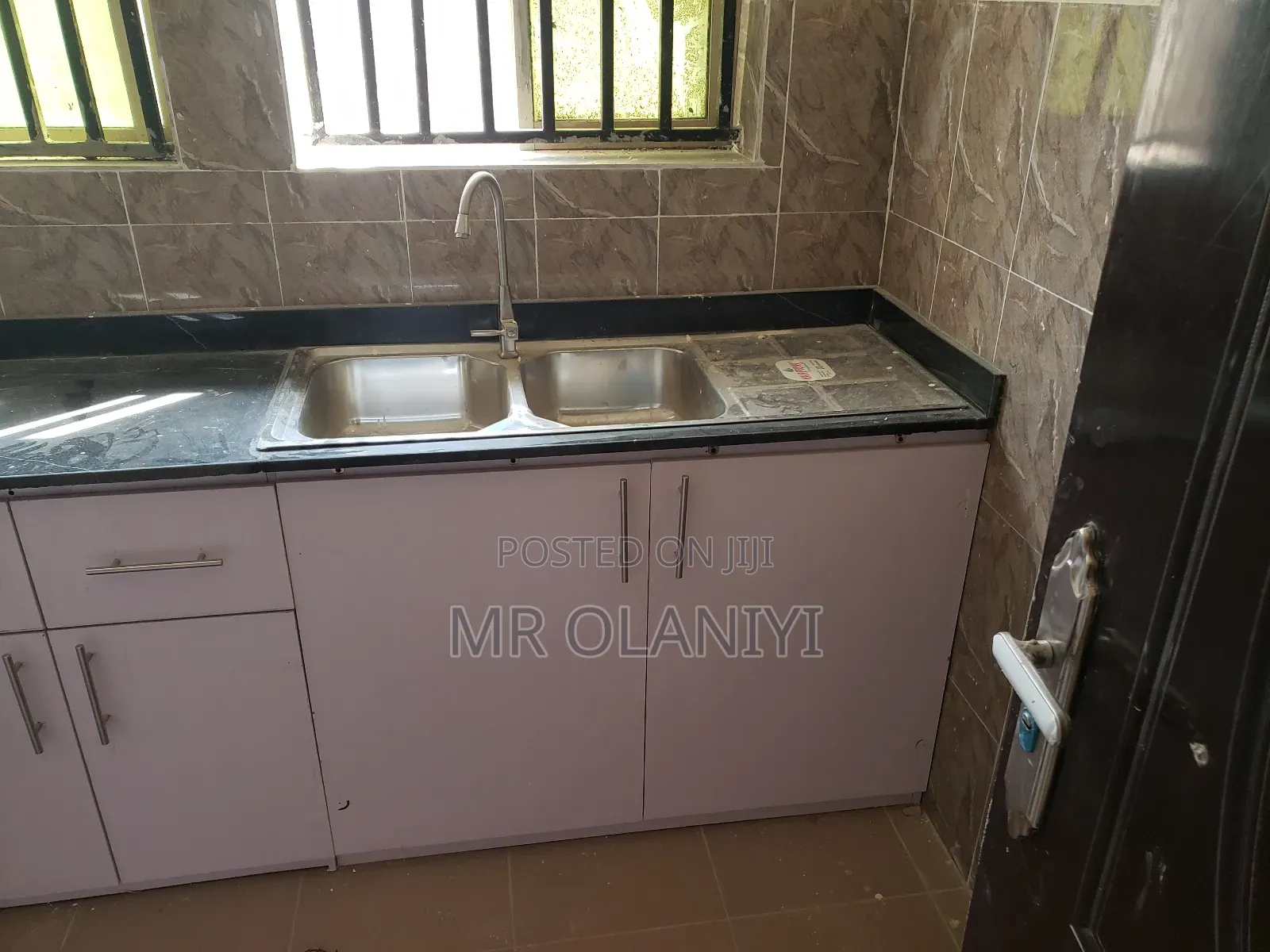 Kitchen Cabinet With Black Marble Top