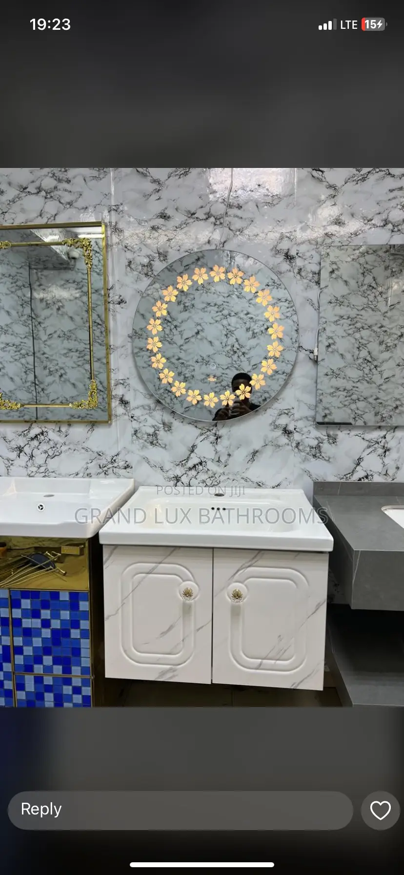 Elegant Single Sink Vanity With Floral Led Mirror Marble