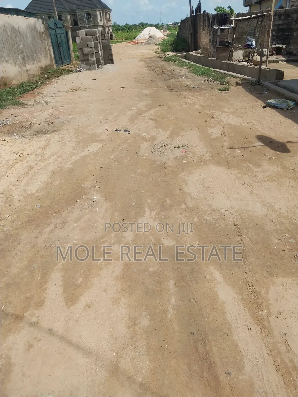 300sqm Fenced Gated Half Plot on Tarred Rd Dopemu Agege