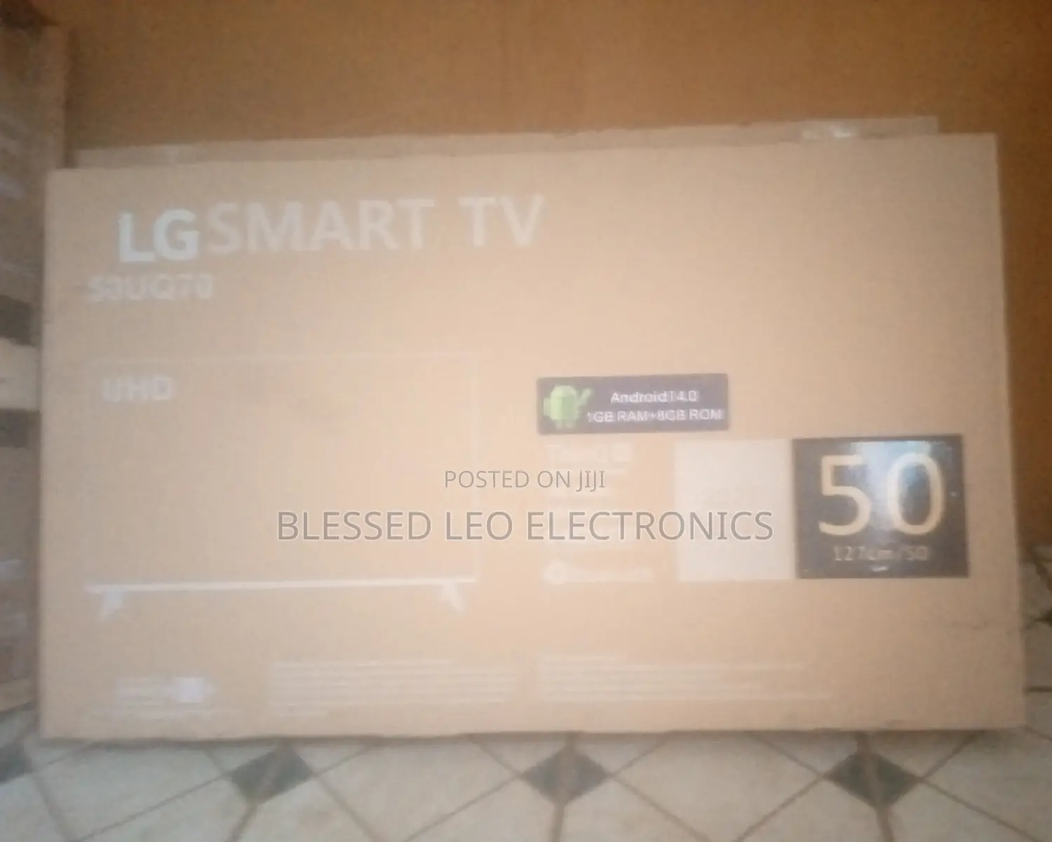 50 Inches Lg With Building Showcasing Brand New Tv