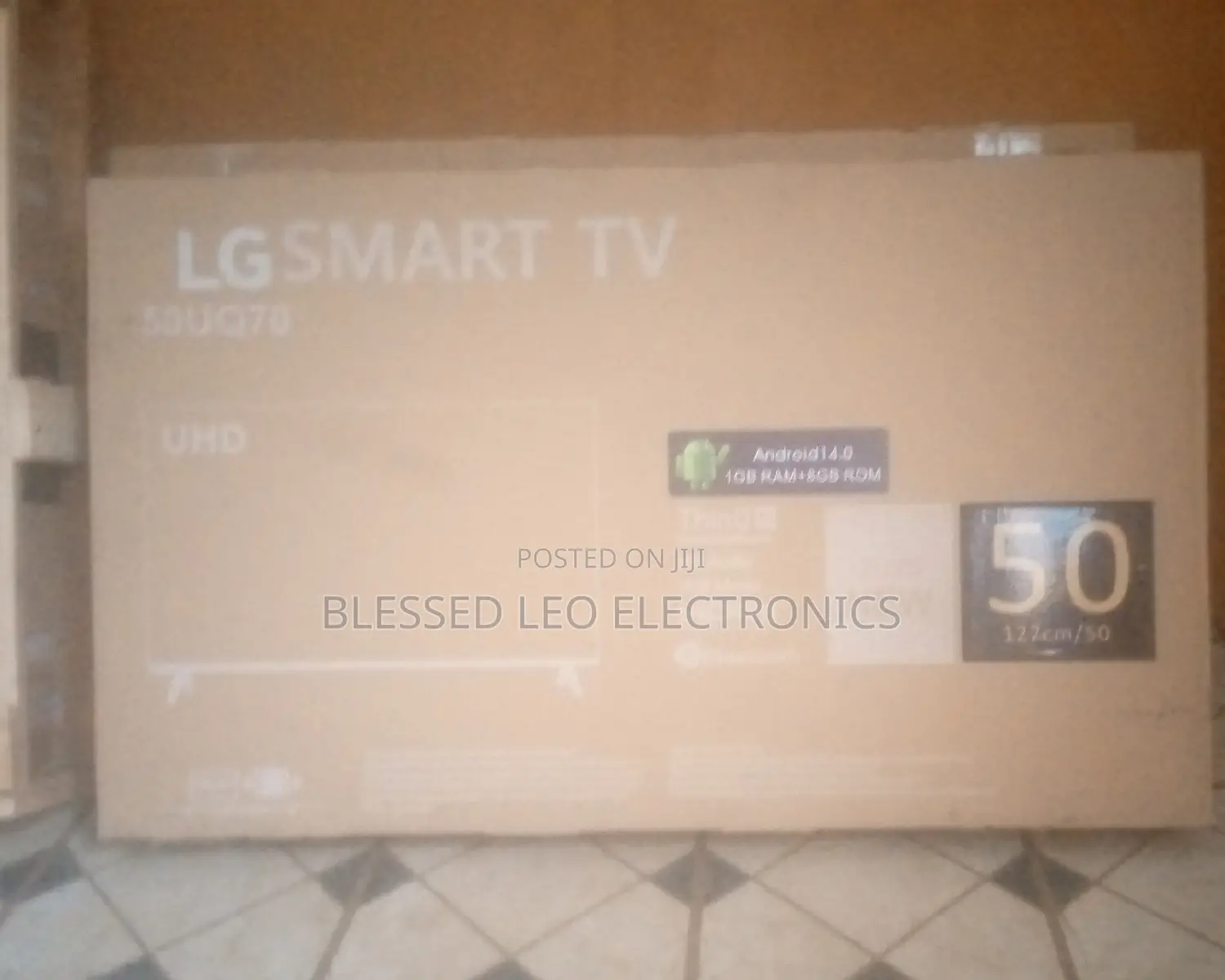 50 Inches Lg With Building Showcasing Brand New Tv