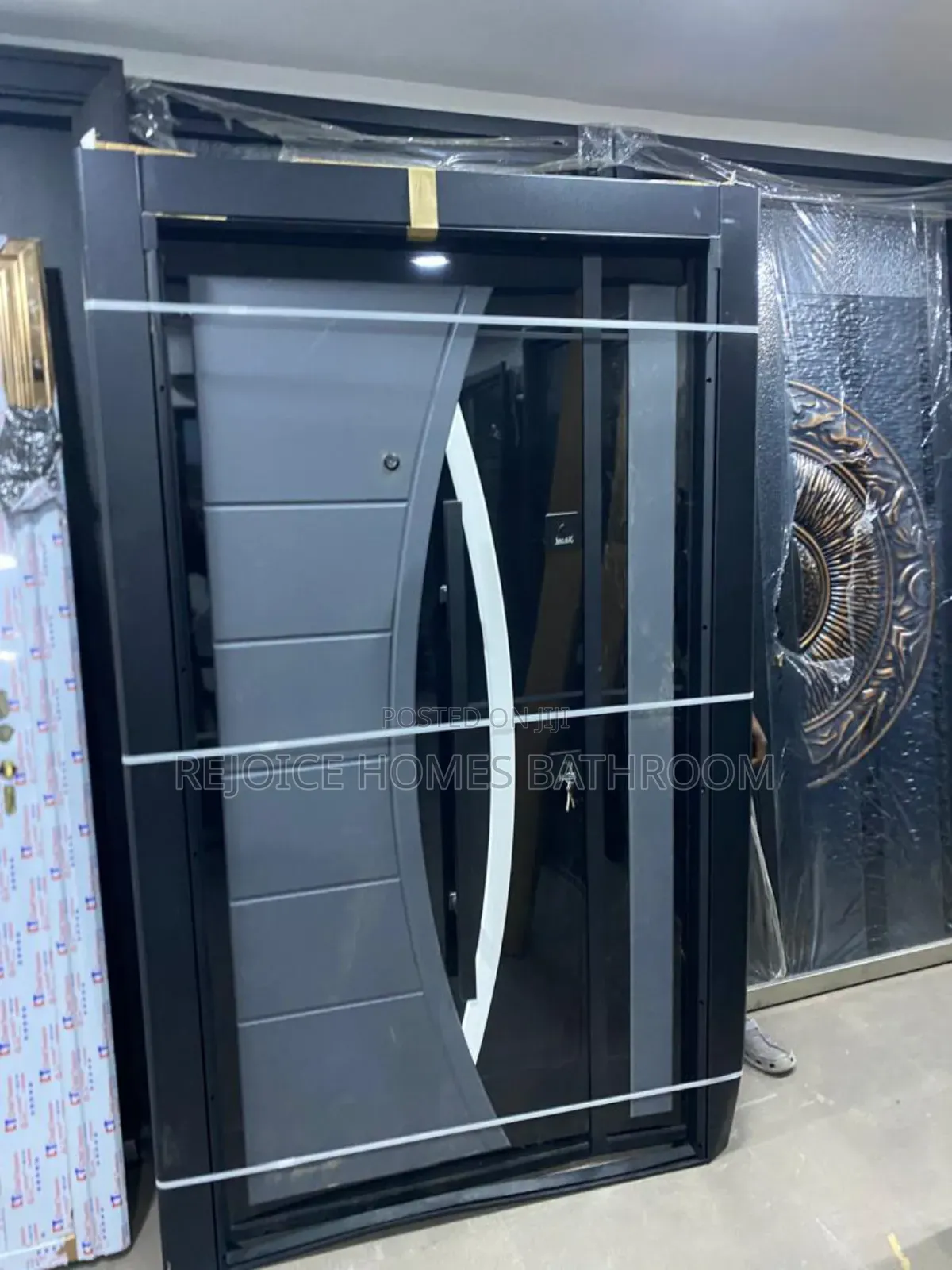 Gray Modern Security Steel Door With Unique Curved Design