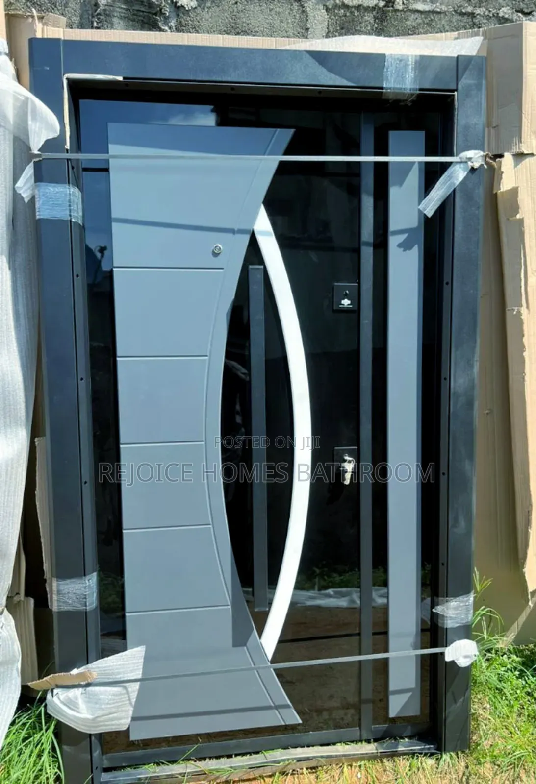 Gray Modern Security Steel Door With Unique Curved Design
