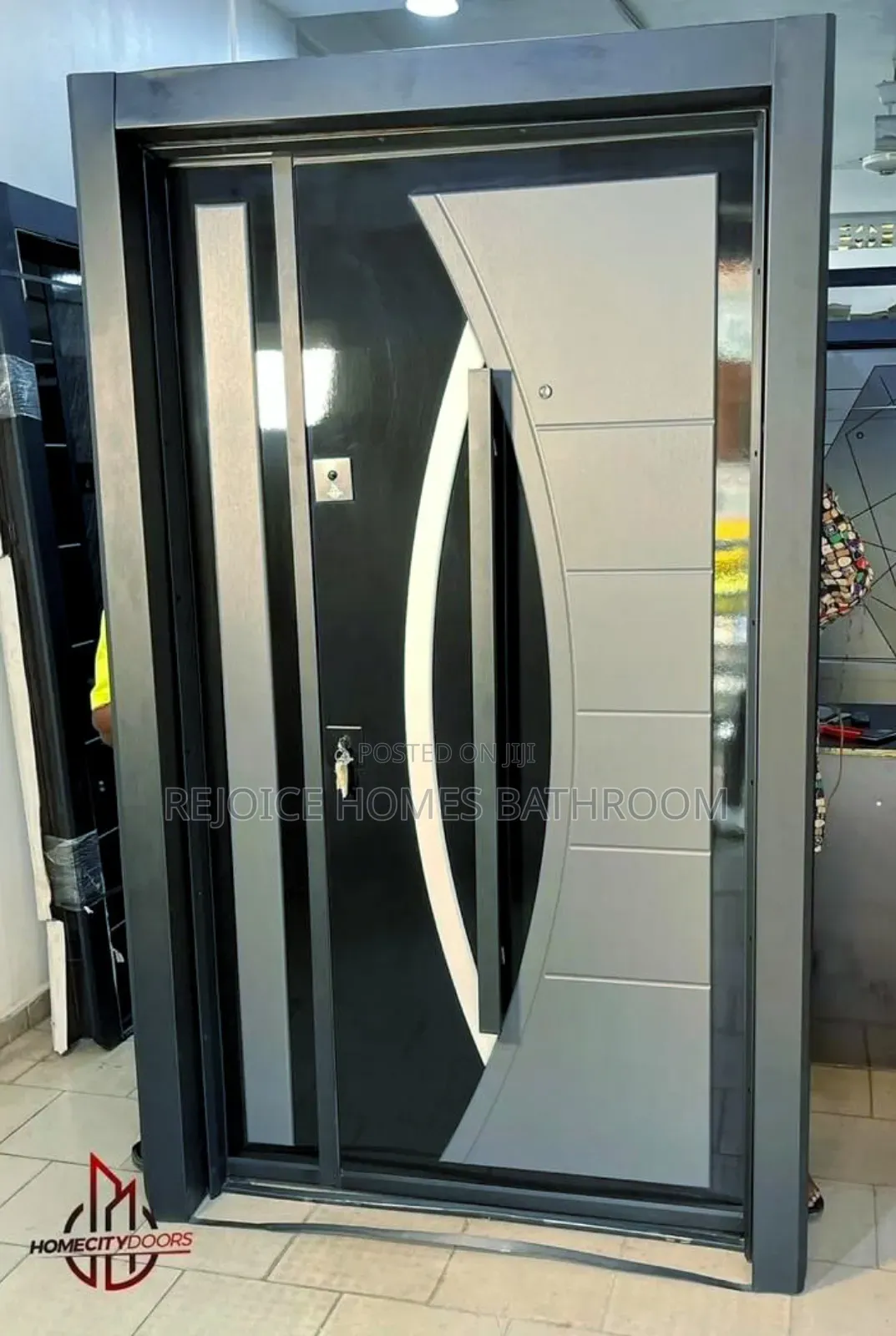 Gray Modern Security Steel Door With Unique Curved Design