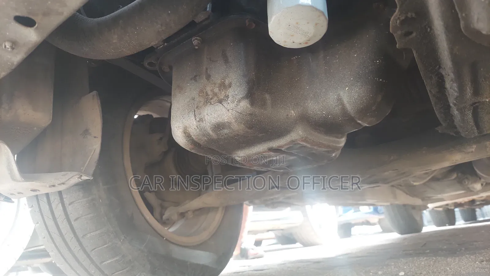 Professional Car Inspection Mechanic With Diagnostic Machine
